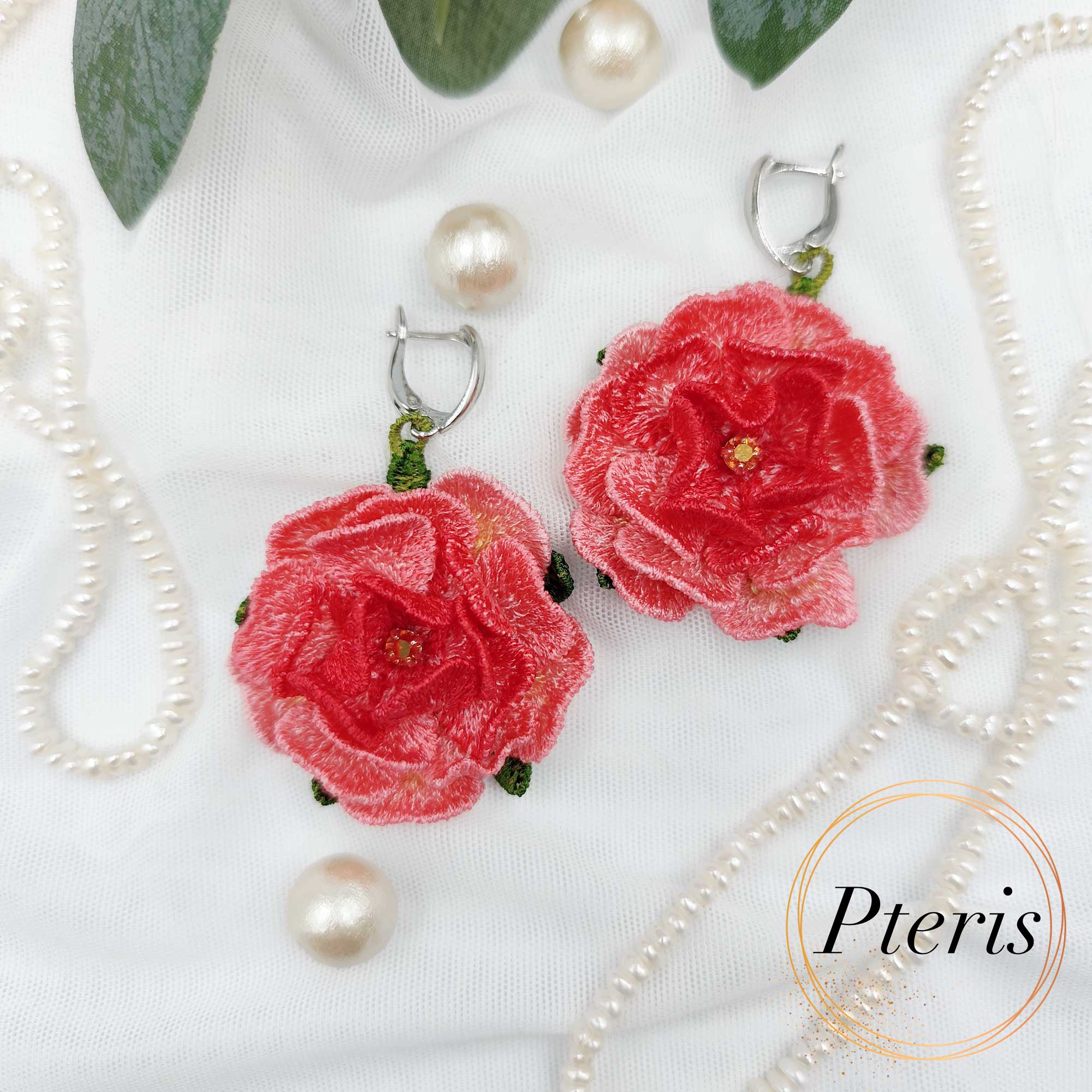 Add a touch of classic romance to your jewelry collection with our exquisite FSL 3D Rose embroidery design. We specifically developed this Freestanding Lace (FSL) project to help you craft realistic, dimensional flowers that work perfectly as earrings, pendants, or delicate charms.