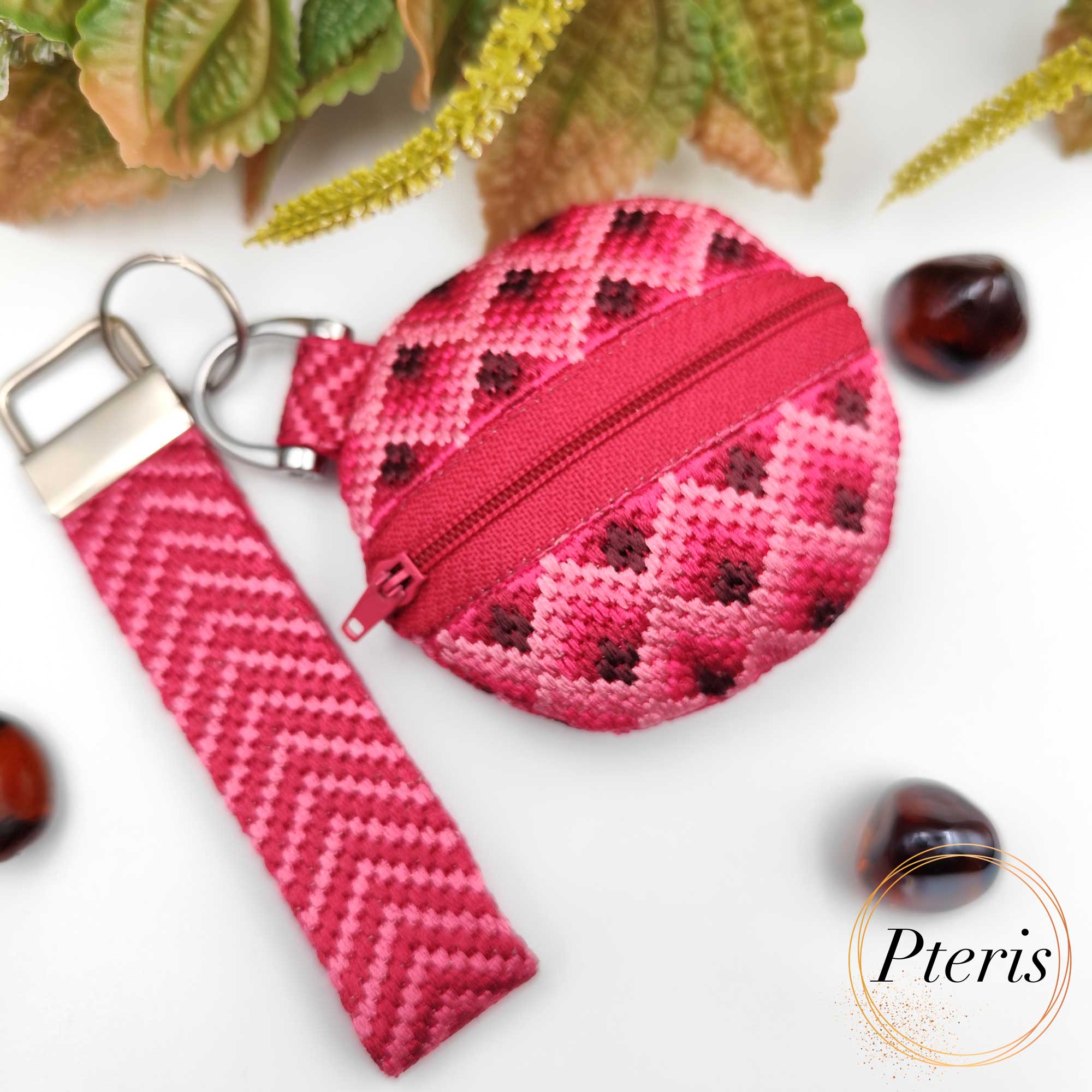 ITH Bargello embroidered round purse with zig-zag pattern and pink zipper