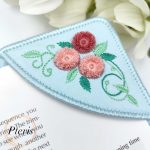 ITH Corner Bookmark embroidery design with 3D pink chenille and fringe roses on light blue fabric