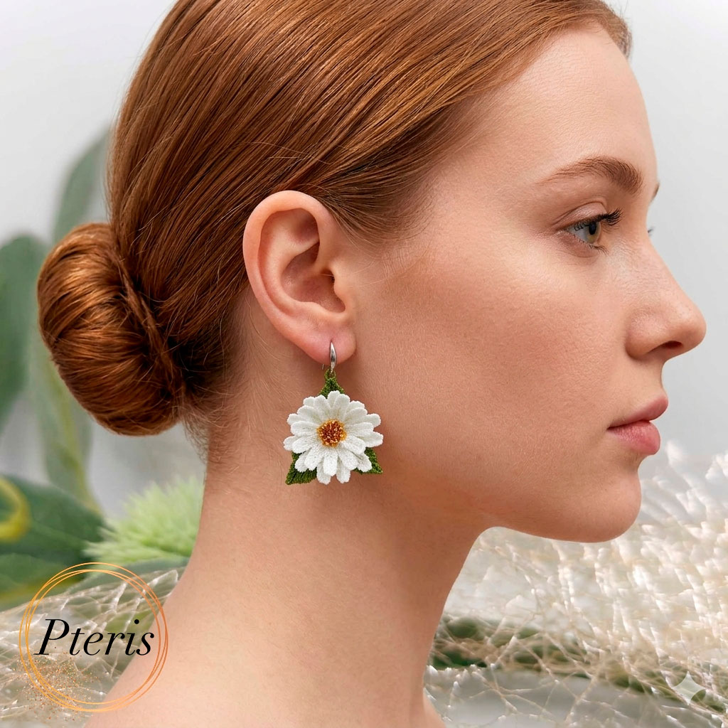 Bring the fresh, cheerful spirit of a summer meadow to your jewelry collection with our 3D Daisy Embroidery Design. We specifically developed this Freestanding Lace (FSL) project to help you craft realistic, high-relief daisies that work beautifully as earrings, pendants, or elegant brooches. This versatile 3D Daisy Embroidery Design captures the classic beauty of white petals and golden centers in every stitch.