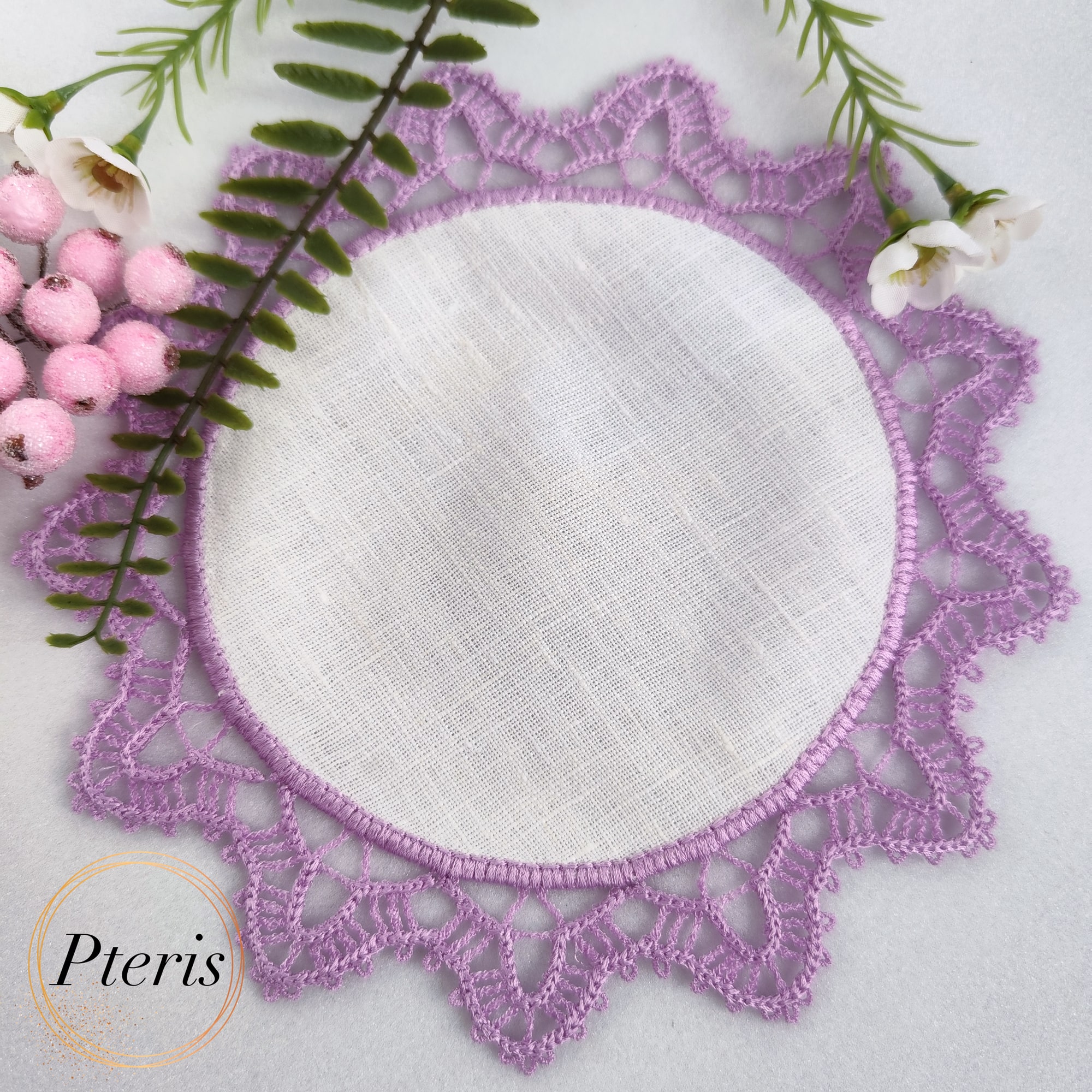 FSL Crochet Style Napkin Design featuring two circular white linen napkins with intricate purple freestanding lace borders that mimic hand-crocheted lace.