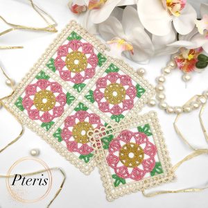 FSL Granny Square Crochet Design featuring embroidered lace squares with pink floral centers, gold accents, and cream-colored crochet-style borders.