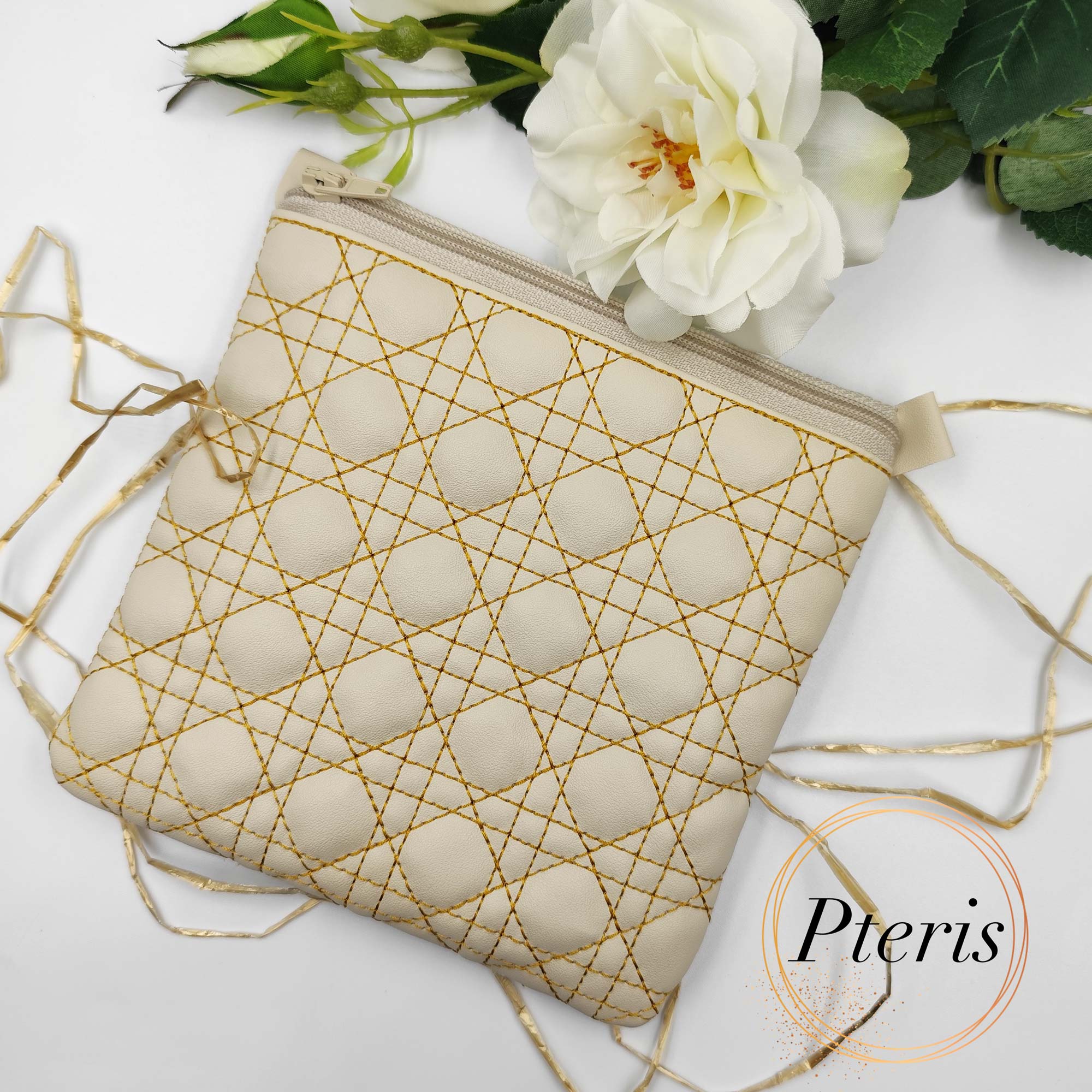 Square Quilted Zipper Pouch ITH embroidery design in cream leather with gold thread