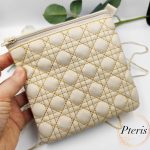 Square Quilted Zipper Pouch ITH embroidery design in cream leather with gold thread