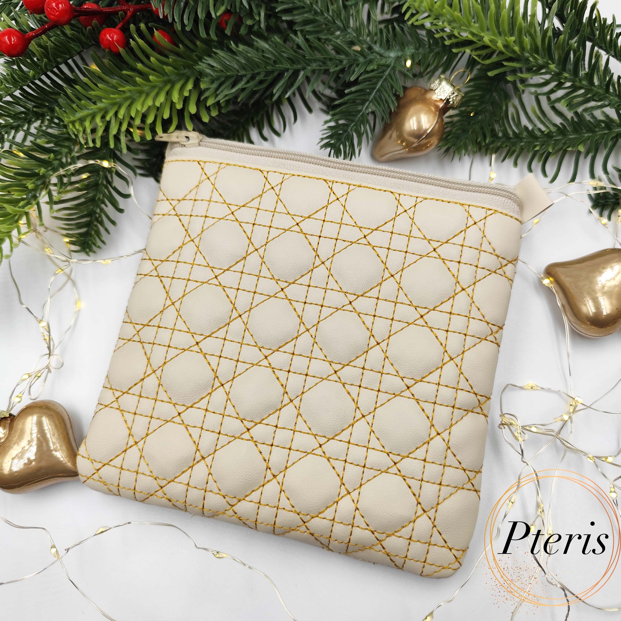 Square Quilted Zipper Pouch ITH embroidery design in cream leather with gold thread
