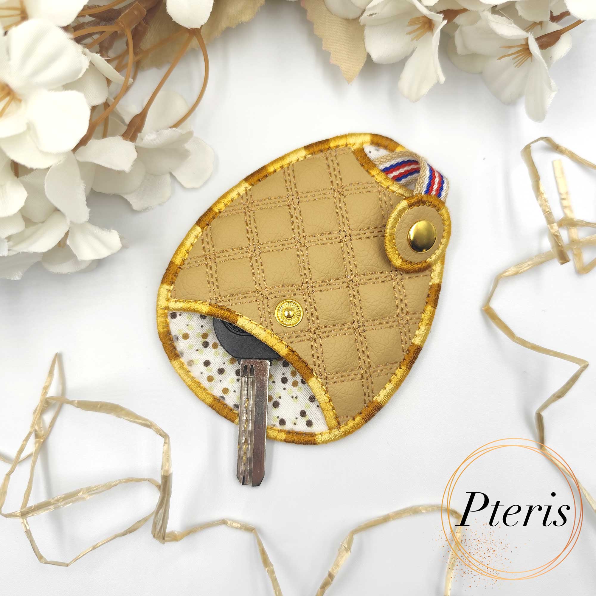 ITH Quilted Key Holder embroidery design with diamond pattern on tan faux leather