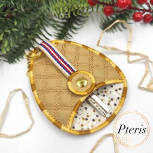 ITH Quilted Key Holder embroidery design with diamond pattern on tan faux leather