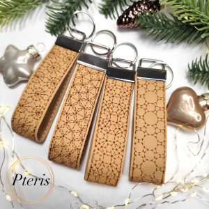ITH Key Fob Wrist Strap machine embroidery design on various faux leather fabrics