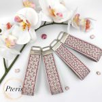 ITH Geometric Quilted Key Fob embroidery design on grey faux leather with magenta stitching
