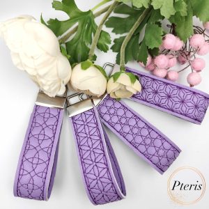 ITH Geometric Wrist Strap Key Fob embroidery design on purple faux leather