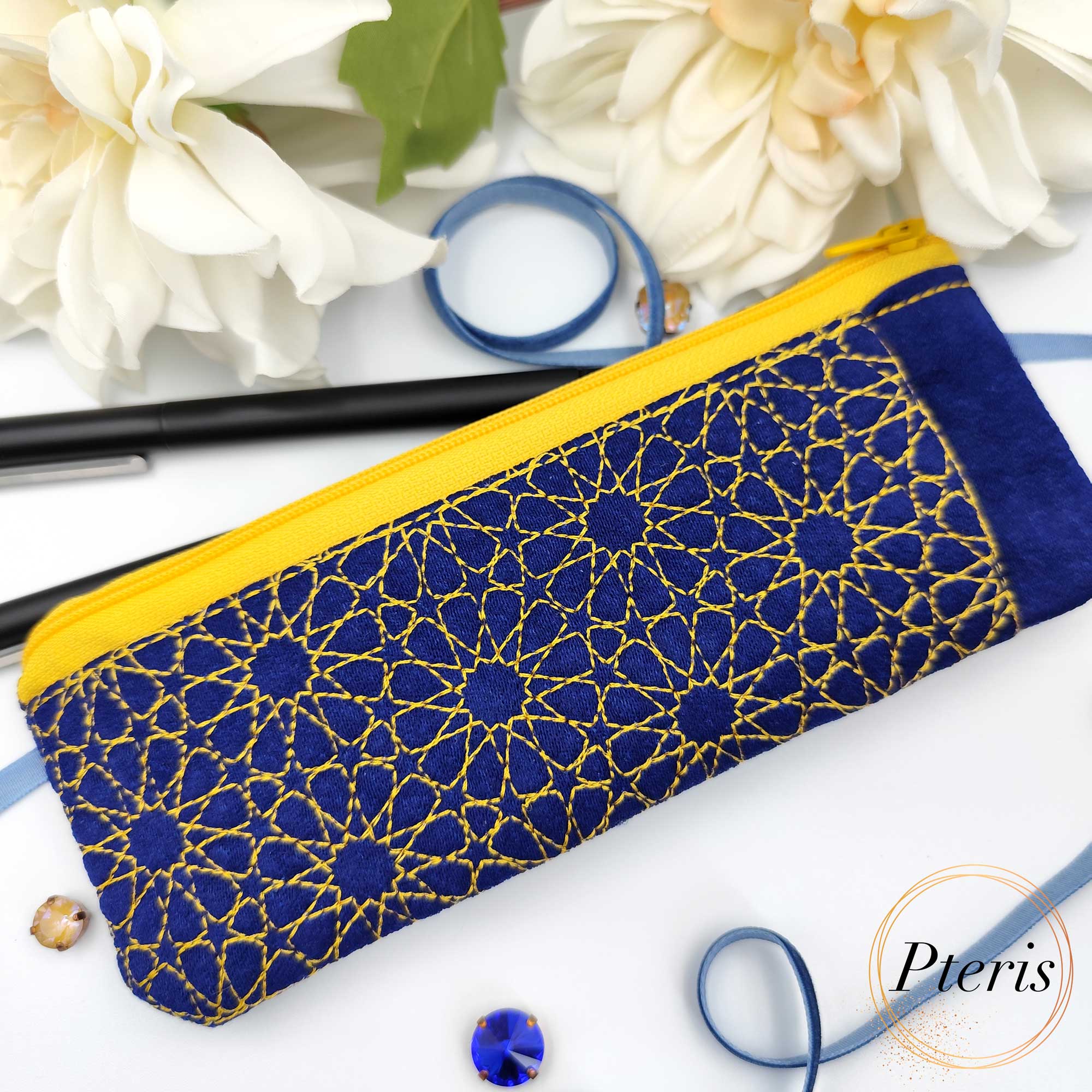 ITH Quilted Pencil Case embroidery design with yellow zipper and blue mosaic pattern