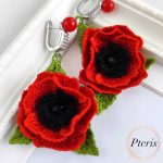 FSL 3D Poppy earrings machine embroidery design featuring bright red petals, black centers, and green leaves on silver jewelry hooks.