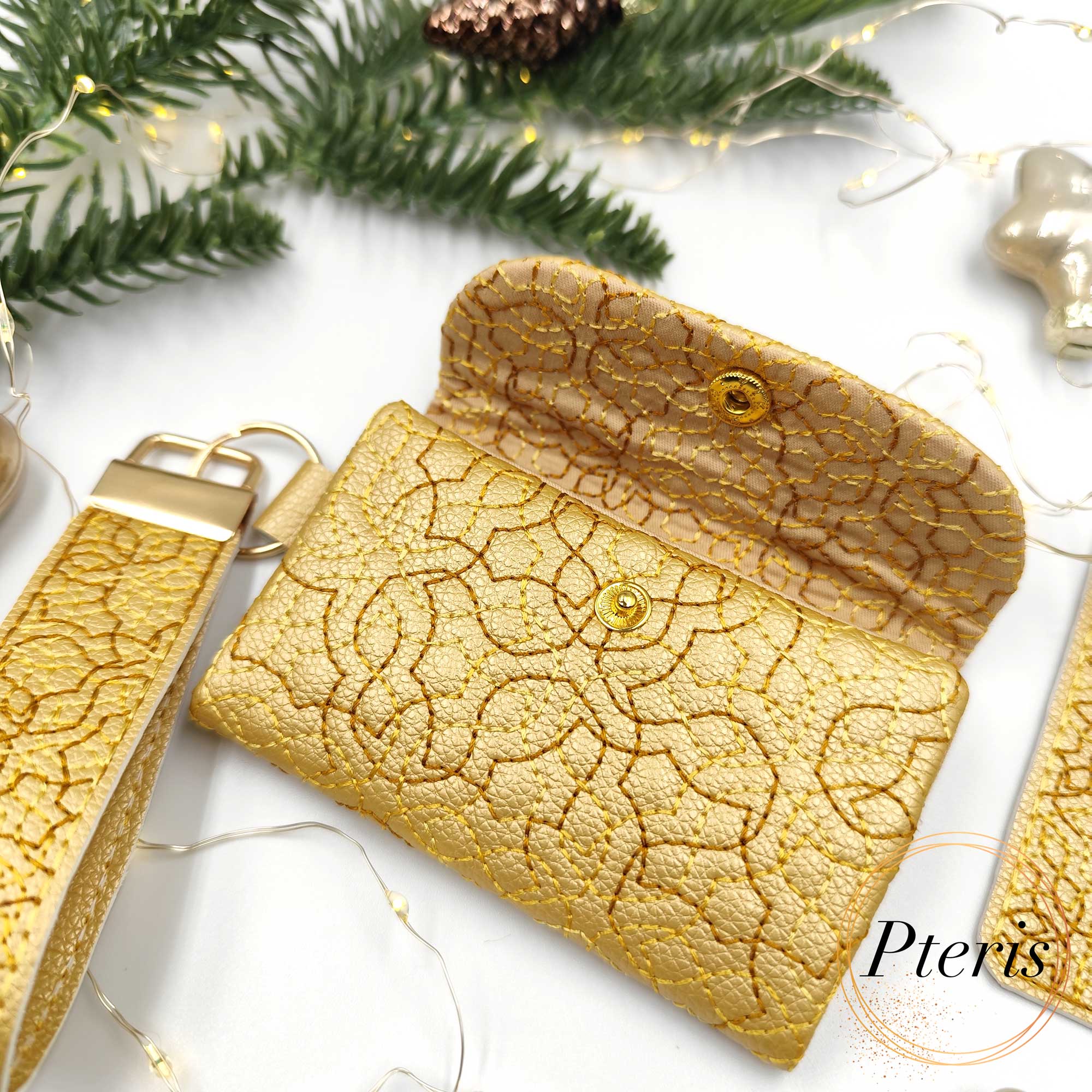 ITH Quilted Card Holder and Key Fob set with geometric star stitching on faux leather