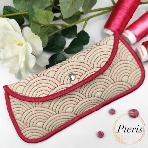Quilted Glasses Case ITH embroidery design with pink wave pattern and snap closure