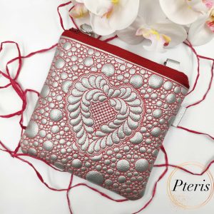 ITH Quilted Heart Square Pouch embroidery design in silver leather with red stitching