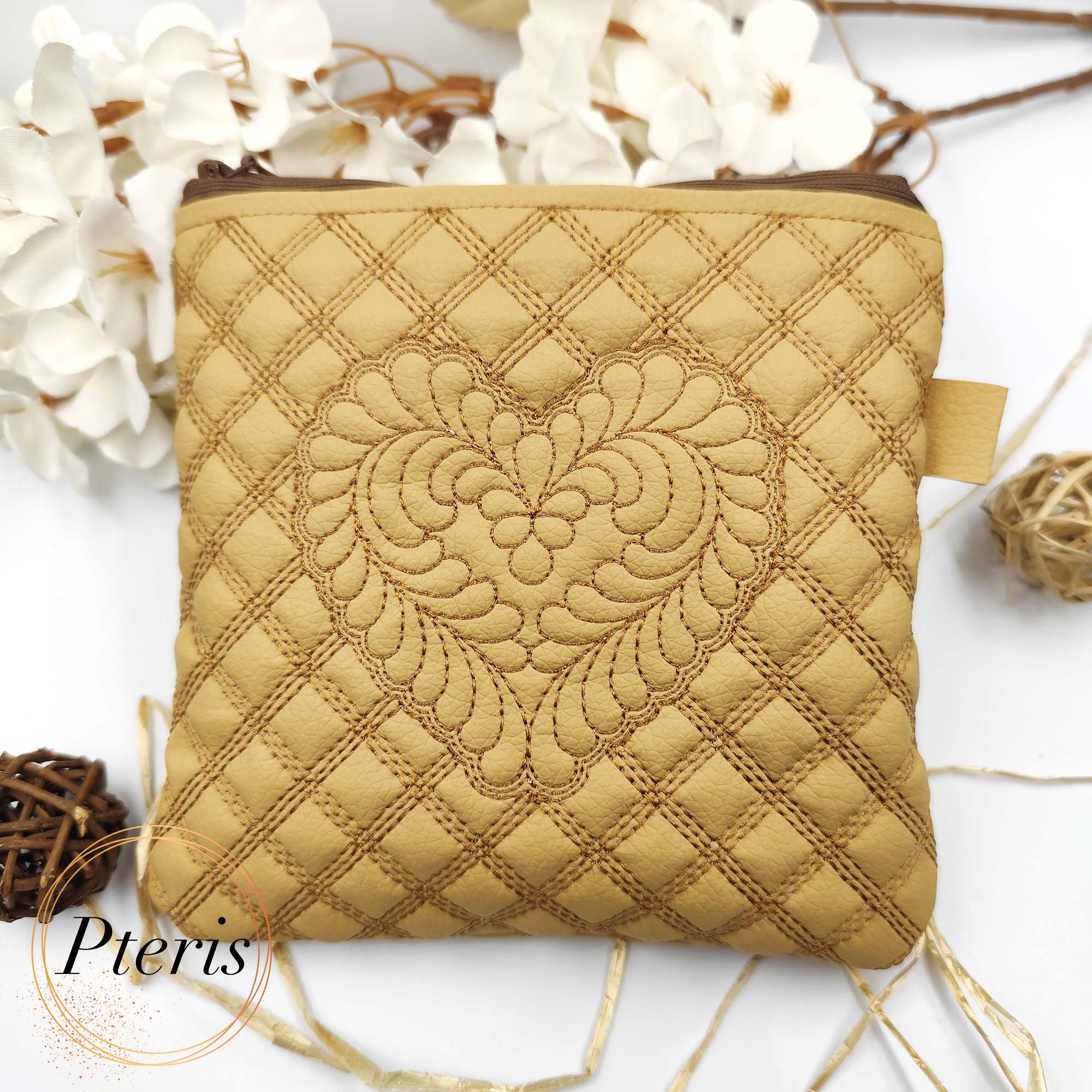 ITH Quilted Feather Heart Square Pouch embroidery design on tan leather