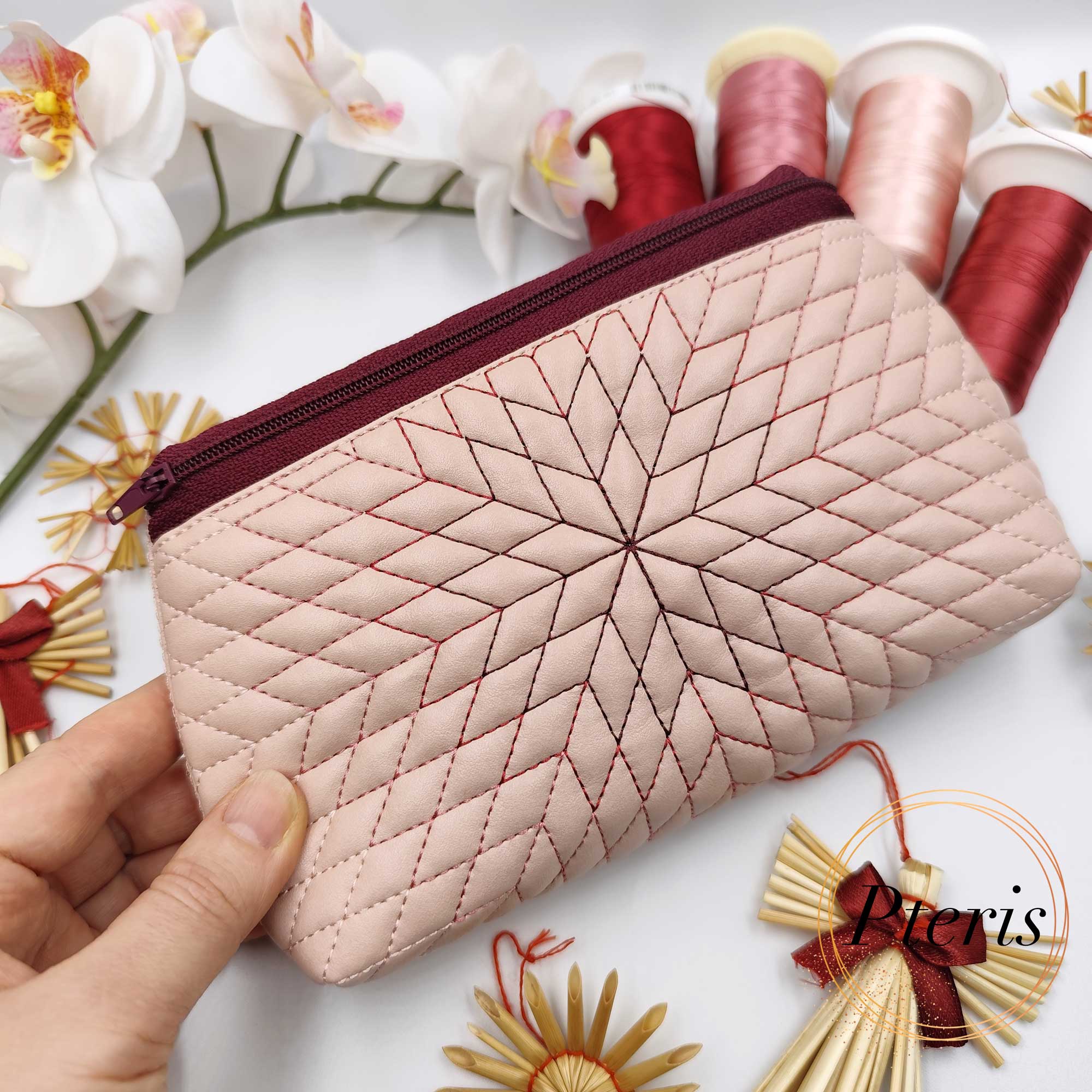 ITH Geometric Star Zipper Pouch embroidery design with radiant pink quilting