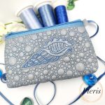 ITH Sea Shell Zipper Pouch embroidery design on silver faux leather