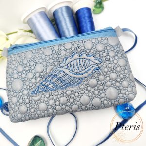 ITH Sea Shell Zipper Pouch embroidery design on silver faux leather