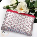 ITH Geometric Zipper Pouch embroidery design with pink Y-pattern quilting on silver leather