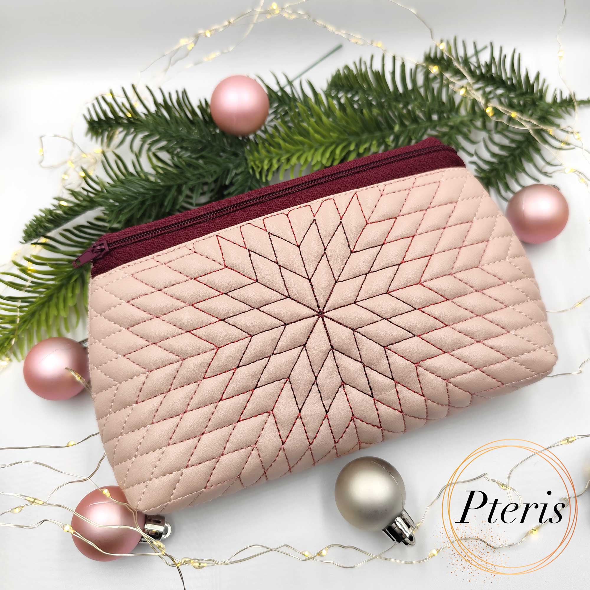 ITH Geometric Star Zipper Pouch embroidery design with radiant pink quilting