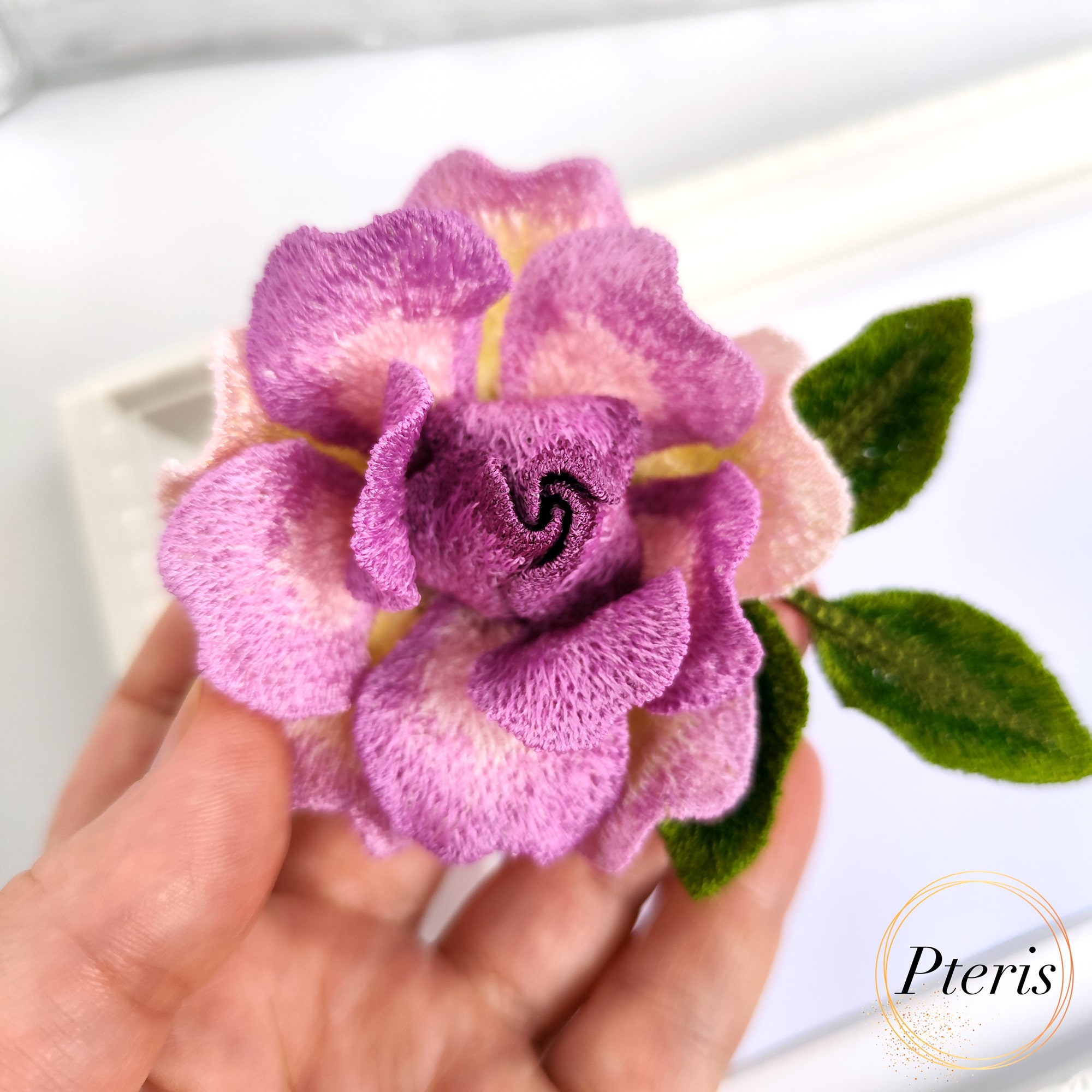 FSL 3D Rose Brooch machine embroidery design featuring purple and pink gradient petals with green leaves