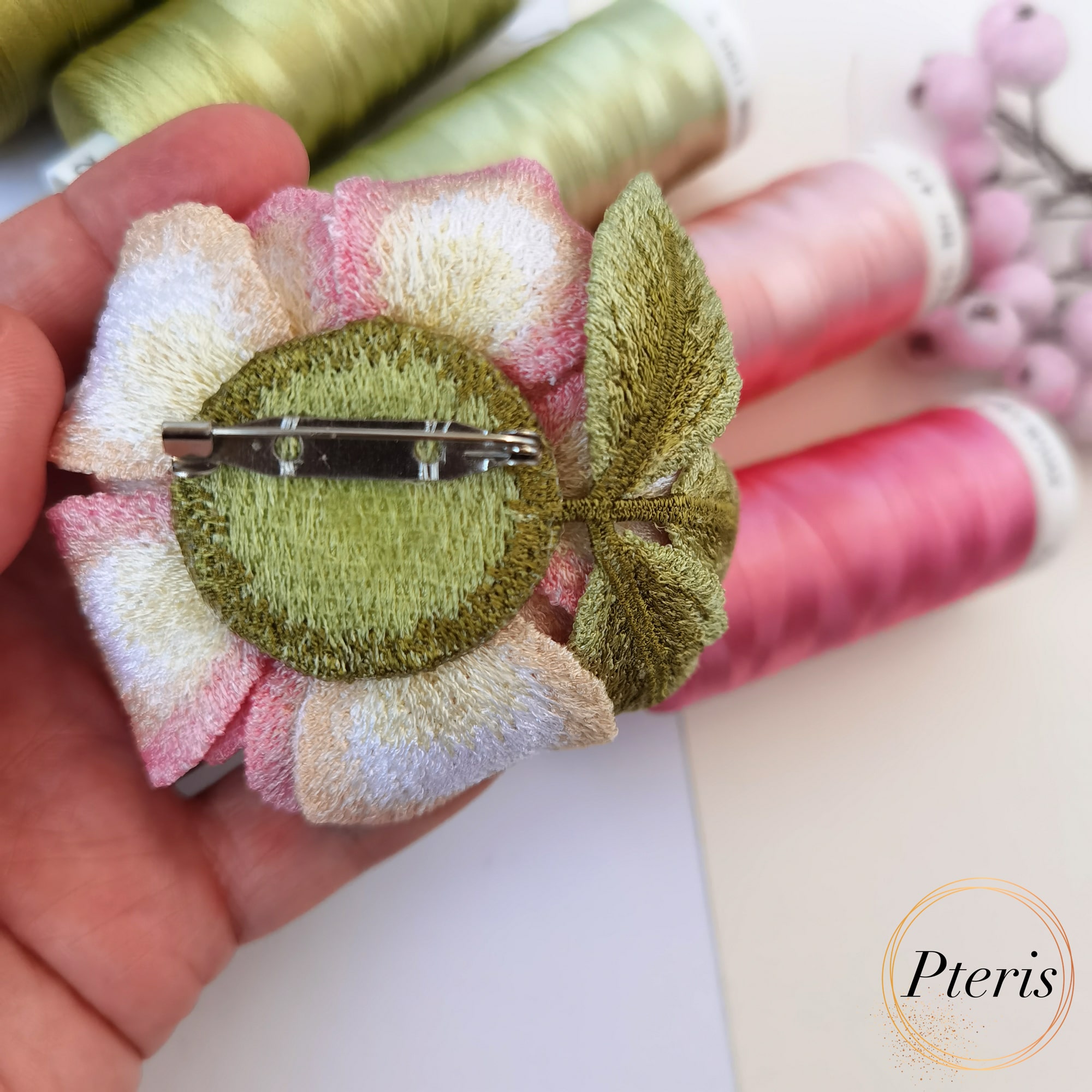 3D Wild Rose Rosehip blossom machine embroidery design with pink gradient petals and green leaves