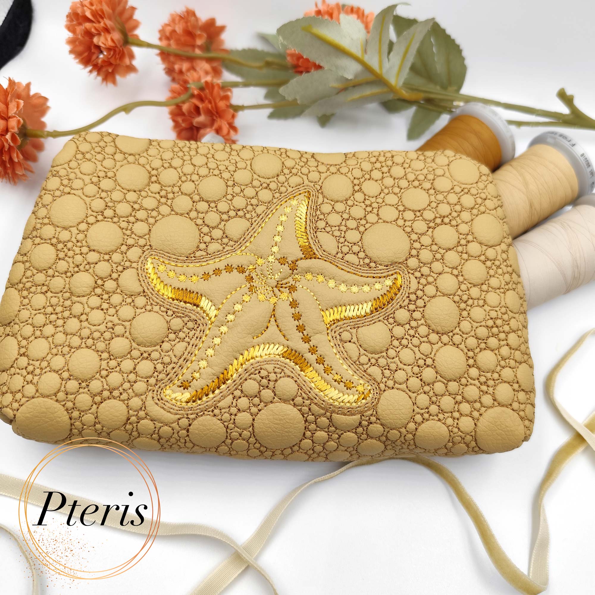 ITH Starfish Zipper Pouch embroidery design in sand faux leather with gold thread