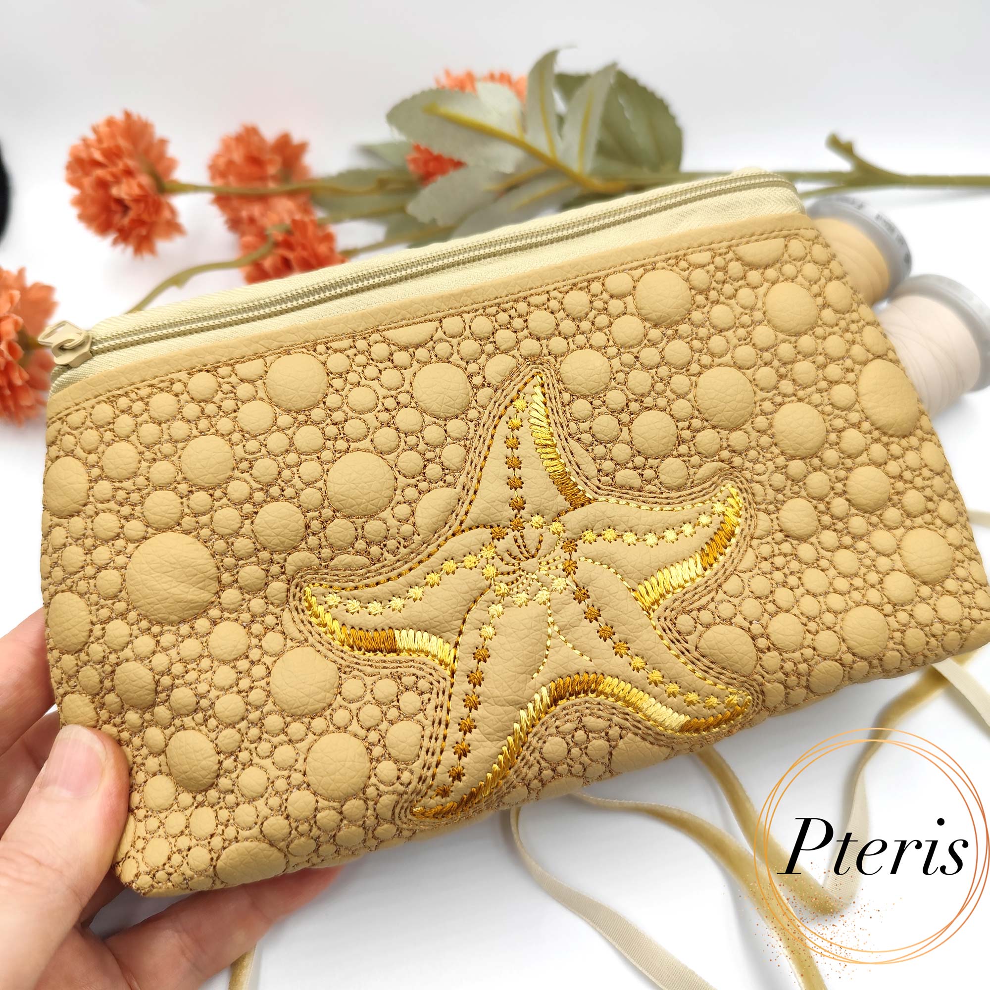 ITH Starfish Zipper Pouch embroidery design in sand faux leather with gold thread