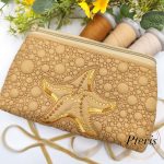 ITH Starfish Zipper Pouch embroidery design in sand faux leather with gold thread