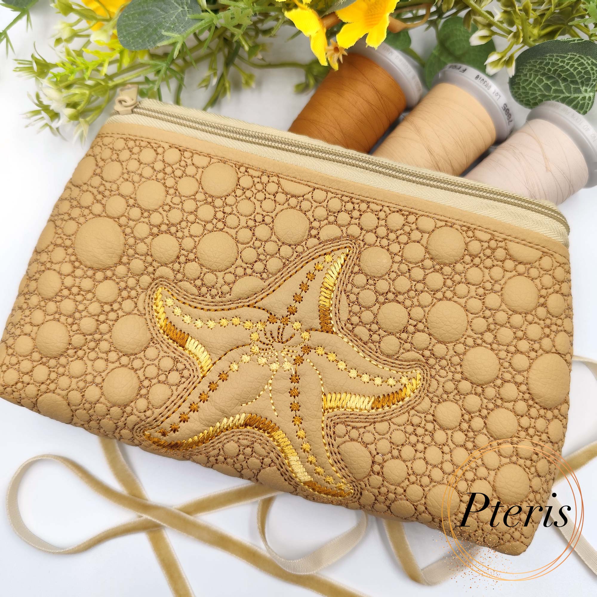 ITH Starfish Zipper Pouch embroidery design in sand faux leather with gold thread