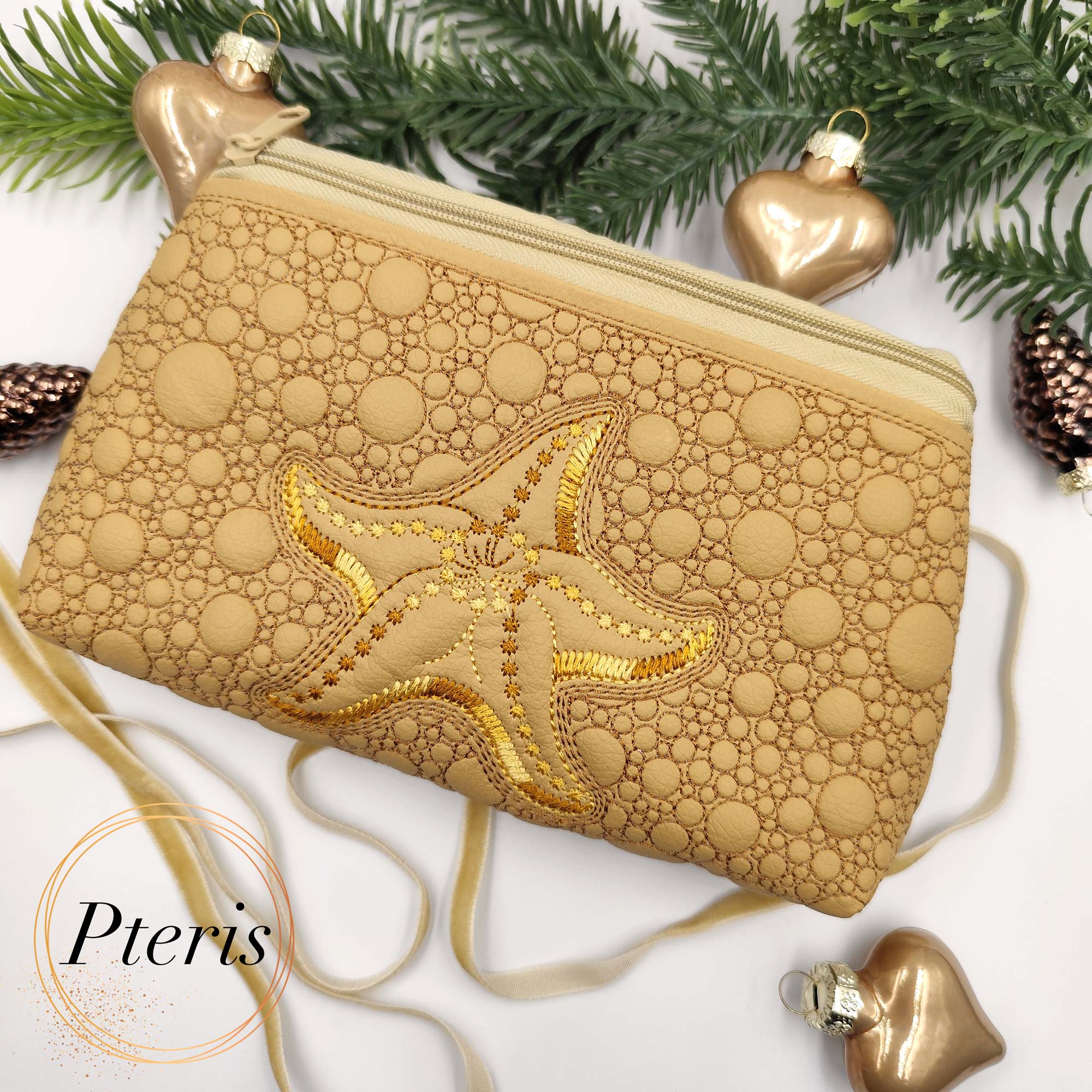 ITH Starfish Zipper Pouch embroidery design in sand faux leather with gold thread