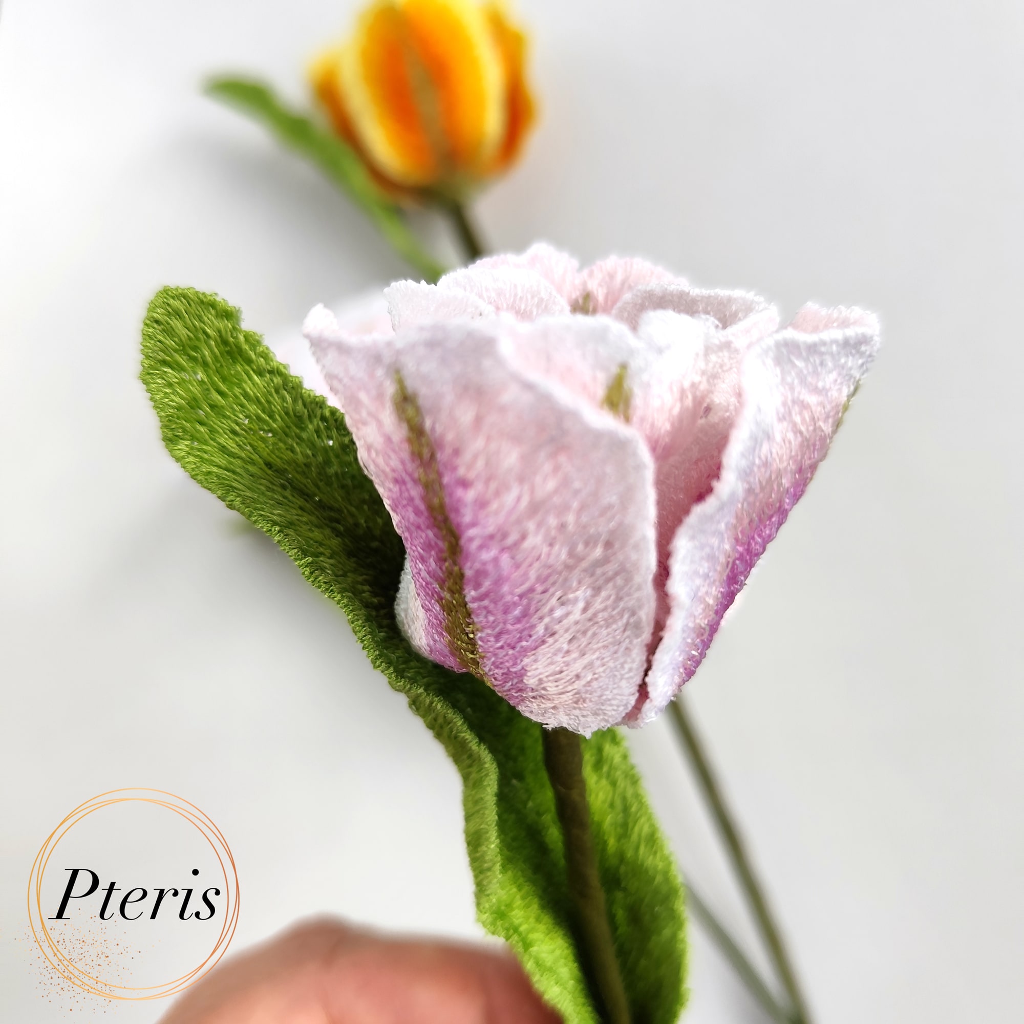 3D Tulip Embroidery Design featuring lifelike embroidered tulips in yellow-orange and pink-white gradients with textured green leaves.