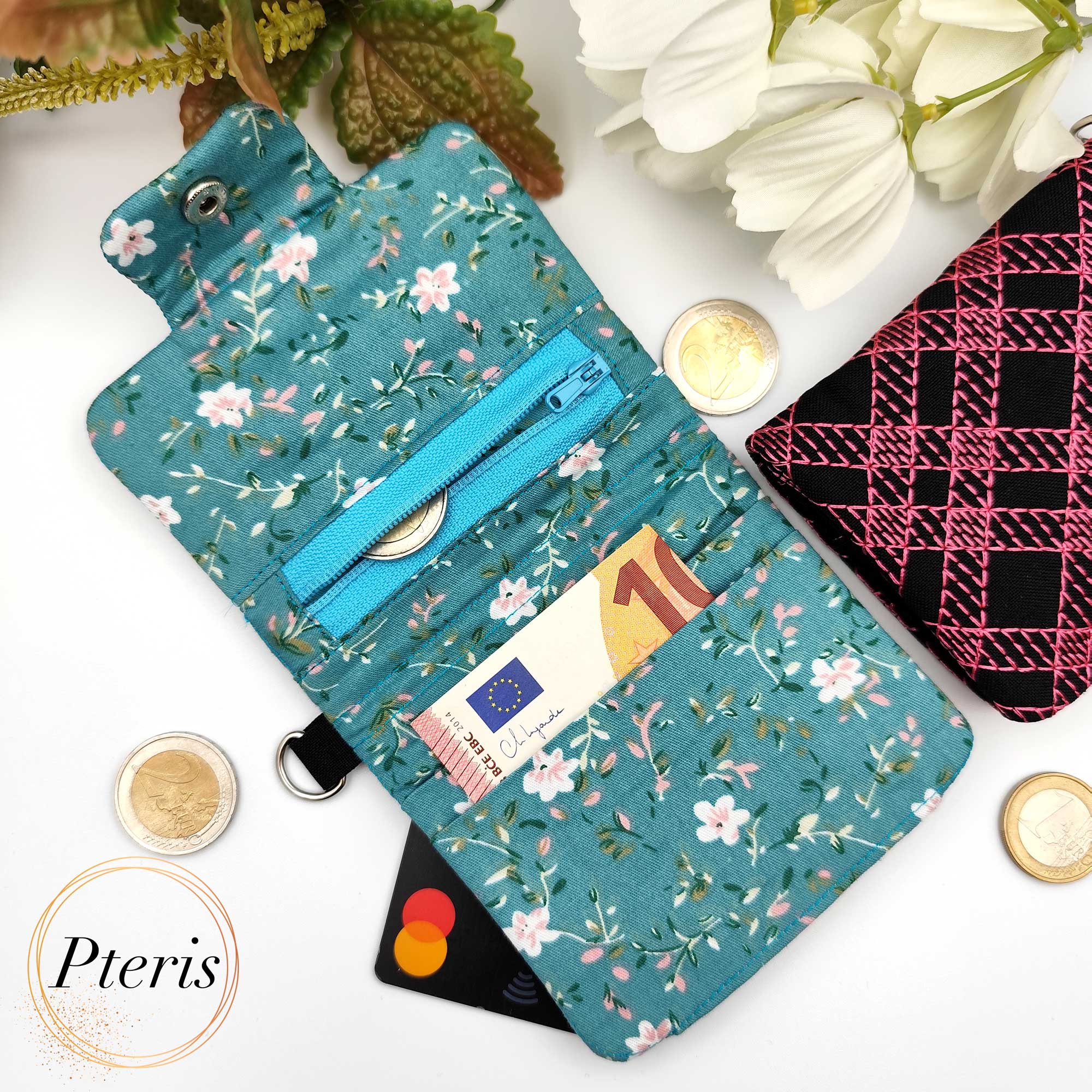 ITH Quilted Wallet embroidery design with blue geometric stitching and floral lining