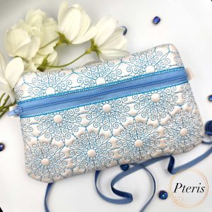 ITH Ornamental Zipper Pouch embroidery design with blue scroll pattern on pearl leather