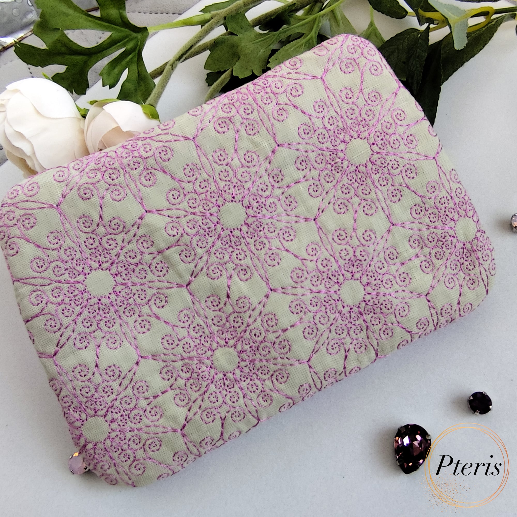 ITH Ornamental Zipper Pouch embroidery design with blue scroll pattern on pearl leather