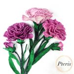3D Carnation FSL Embroidery Design showing a realistic bouquet of purple and pink embroidered carnations with green leaves and buds on a white background.
