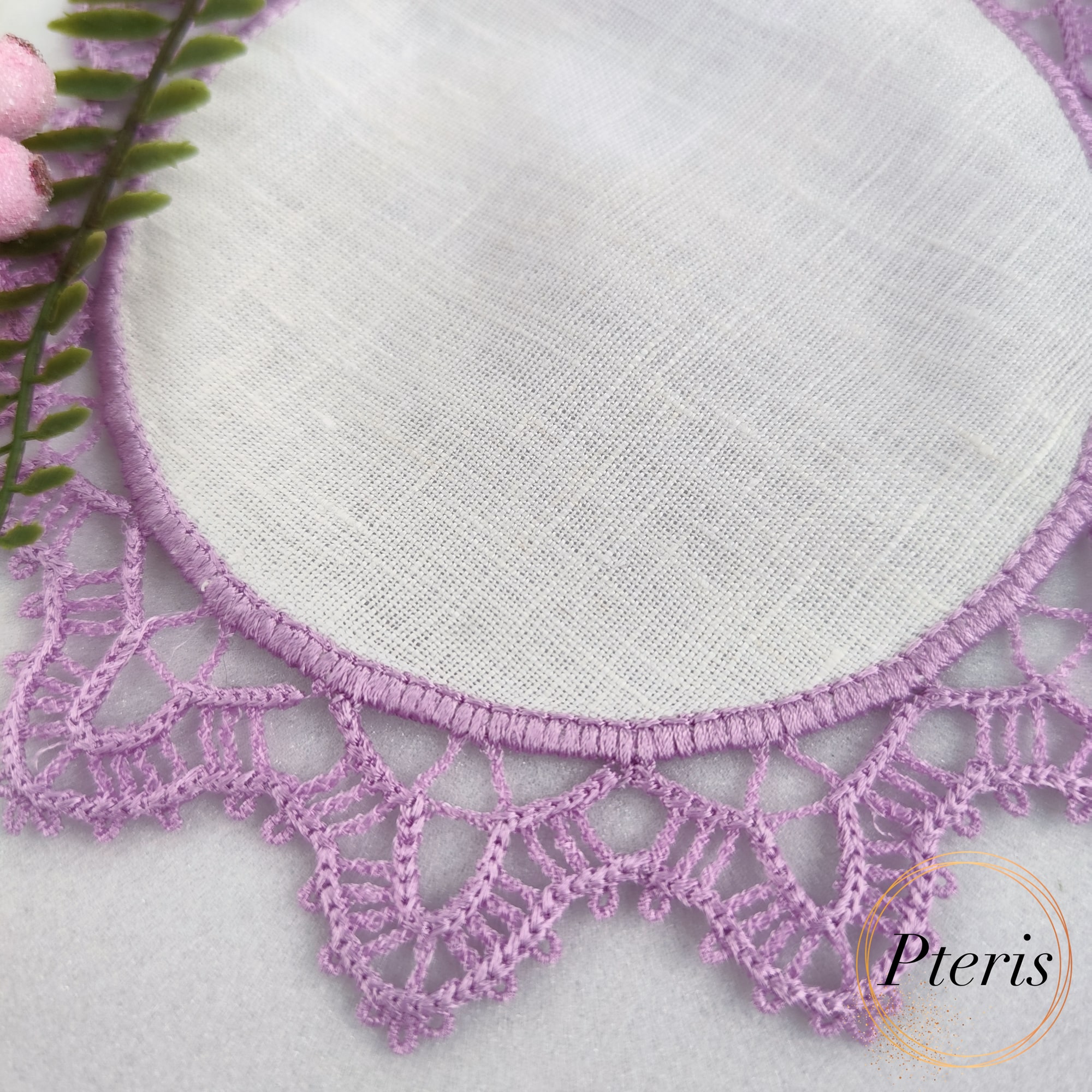 FSL Crochet Style Coaster Design featuring two lavender-colored lace napkins with white fabric centers, styled with pink berries and white flowers.