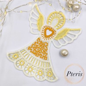 FSL Lace Angel Suncatcher embroidery design featuring a white and yellow freestanding lace angel with a heart at its center, styled with fairy lights and pearls on a white background.