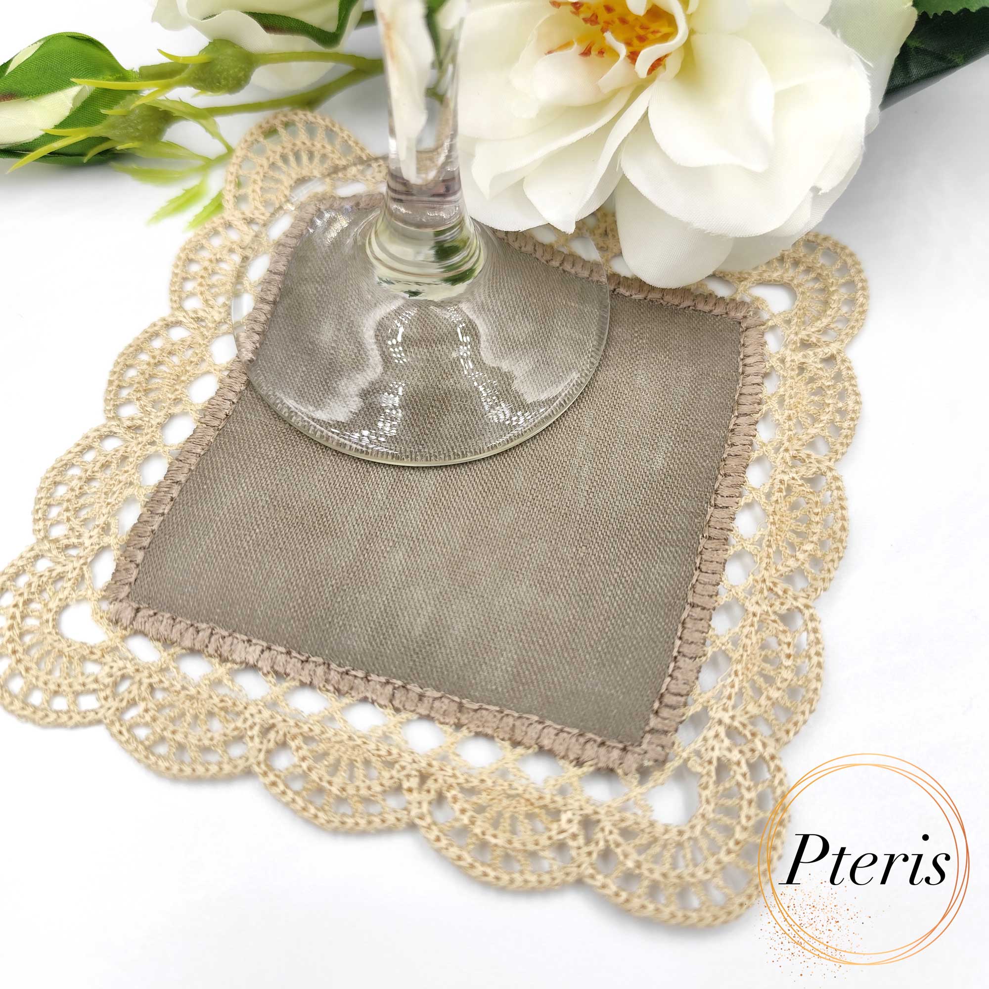 FSL Crochet Style Napkin Design featuring a square navy blue linen center surrounded by an intricate gold freestanding lace border, displayed with blue embroidery threads.