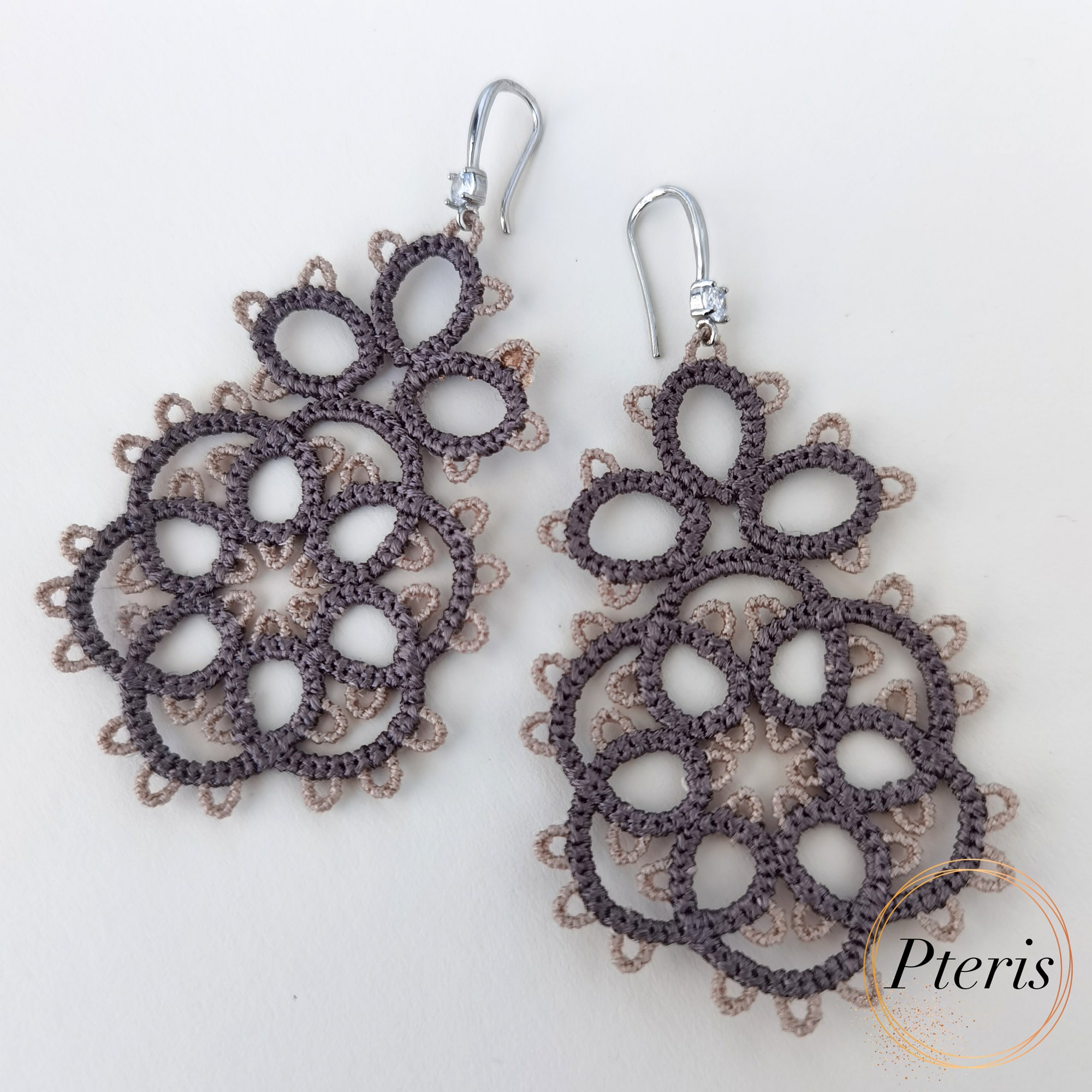 FSL Tatting Earrings Embroidery Design featuring a pair of intricate, teardrop-shaped freestanding lace earrings in a traditional knotted tatting style.