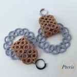 FSL Tatting Earrings Embroidery Design showing a pair of intricate freestanding lace earrings with brown top elements and blue-grey looped lace bottoms.