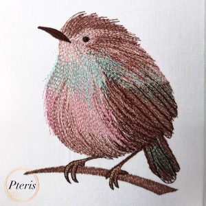 Elegant bird machine embroidery design showing a gracefully stitched bird motif with clean outlines and detailed feather accents, displayed flat on fabric.