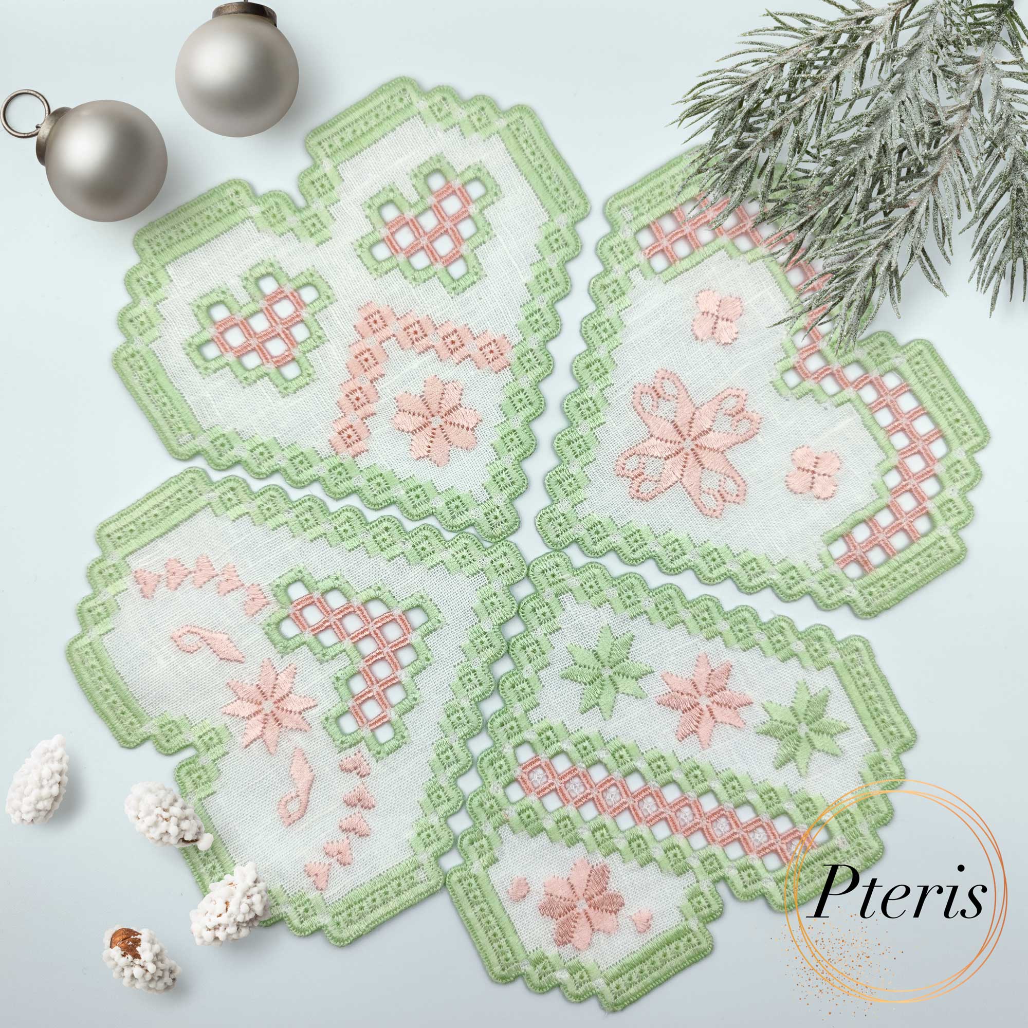 Heart Hardanger cocktail napkin machine embroidery design bundle showcasing four distinct heart-shaped linen napkins with pastel green scalloped borders and pink geometric cutwork lace window inserts.